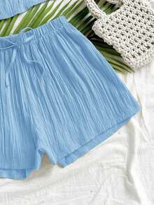 Conjunto de 2 piezas de mujer con camiseta sin espalda de unicolor y dobladillo asimétrico, y shorts sueltos con cordón, casual adecuado para salidas de verano y la playa - Azul - Ver 3