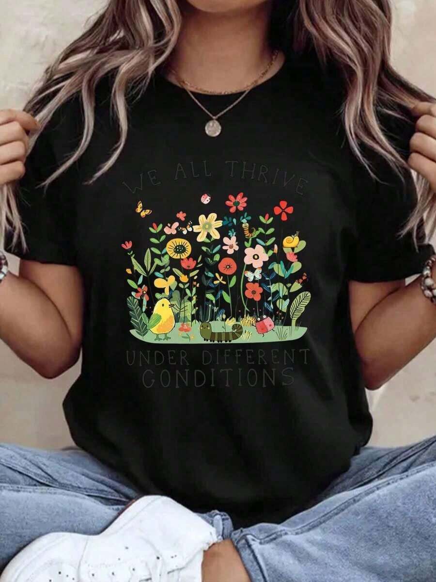We All Thrive Under Different Conditions. Floral-Inspired T-Shirt For Women And Men, Featuring A Bird, Butterfly, And Flower-Friendly Design, Perfect For Earth Day And Everyday Wear. Unisex Short-Sleeve T-Shirt With A Crew Neck, Urban Vintage Style, 220g, 100% Cotton. - 黑色 - 查看 1