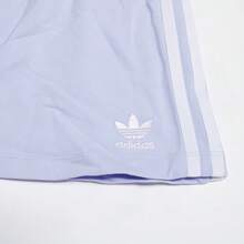 Adidas Chân váy ngắn dệt kim thể thao thường ngày dành cho nữ, phong cách tối giản, thời trang xuân/hè, với sọc bên hông, mã sản phẩm IP0701. - Màu tím nhạt - Xem 3