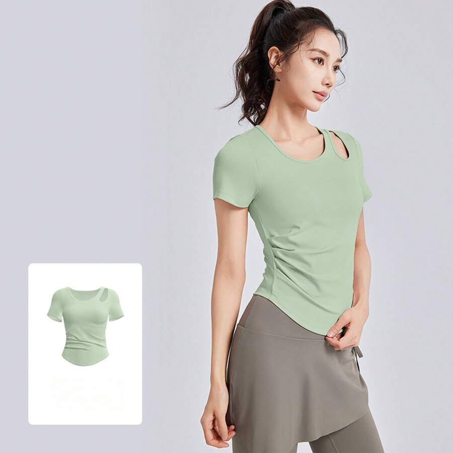 Top deportivo de manga corta para mujer con diseño fruncido y detalle recortado, copa integrada, ideal para yoga y entrenamiento - tiernos brotes verdes - Ver 1
