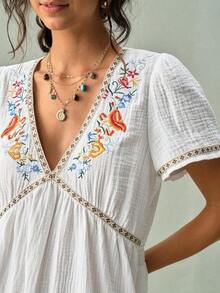 Vestido mini con cuello en V y decoración bordada para mujer, vestido casual blanco para mujer, adecuado para varias ocasiones - Negro - Ver 6