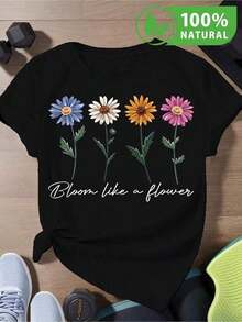 Camiseta Negra Unisex con Diseño Floral Vintage de Margaritas y Mensaje Inspirador Bloom Like a Flower Perfecta para Primavera Verano Estilo Casual Confortable Ideal para Regalar Looks Juveniles y Modernos  2023 en México - Negro - Ver 1
