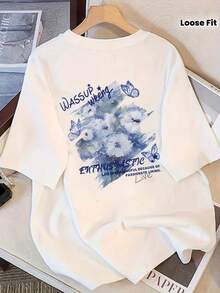 Camiseta gráfica 'Wassup Vibing' para mujer - Blanco, manga corta, ajuste holgado, top casual de verano con diseño de mariposas y flores, estilo relajado, top casual de verano |   Top de ajuste holgado |   Camiseta con estampado de dibujos animados, camisetas para damas - Blanco - Ver 6