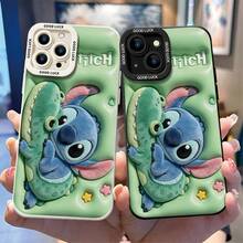 Disney Lilo & Stitch Stitch Hugging Dino Phone Case, This Protective Phone Case Features Adorable Stitch Cuddling A Fluffy Green Dinosaur Plush Toy, With "Lilo & Stitch" Lettering And Tiny Floral‑Heart Accents On A Light Green Background. Built With Flexible Durable TPU Material, It Shields Against Daily Scratches, Bumps And Minor Impacts. Compatible With IPhone 17, 16, 15, 14, 13, 12, 11 Pro Series And Galaxy S22, S23, S24, S25 Models. A Cute Playful Option For Disney Plush‑Themed Fans. - trắng - Xem 3