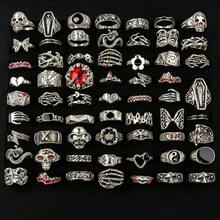 Bộ 10/20 chiếc nhẫn phong cách Punk Goth cổ điển, thiết kế bao gồm hình mắt to, móng vuốt, cú, rắn, ếch, cá sấu, lông vũ, hình trái tim. Thích hợp cho các bữa tiệc, quán bar, câu lạc bộ, người đi xe máy, phụ kiện thời trang hàng ngày và quà tặng. - Nhẫn hình đầu lâu phong cách retro punk với mắt nhỏ giọt. - Xem 3