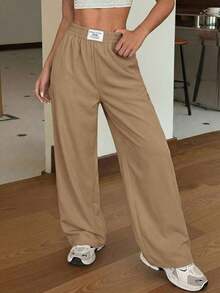 Pantalones rectos y sueltos de pierna ancha de color negro con estampado tipo zhanga para vacaciones de primavera y verano - Caqui - Ver 1