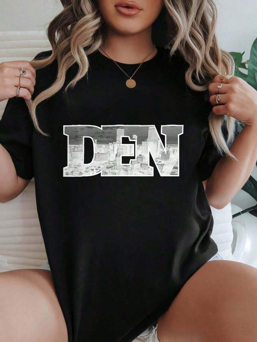 Nueva Llegada 2026 Camiseta de Mujer Oversize Opciones en Negro y Blanco Estampado Gráfico DEN Camisetas Casuales para Uso Diario Tops de Verano Camisetas Gráficas Conjuntos de Verano para Mujer Camisetas Cortas para Mujer Tops para Mujer Ropa Vintage de Algodón Linda para Mujer Tela Suave Transpirable Moda 100% Algodón Camiseta de Mujer para Uso Diario con Estampado Gráfico - Negro - Ver 1