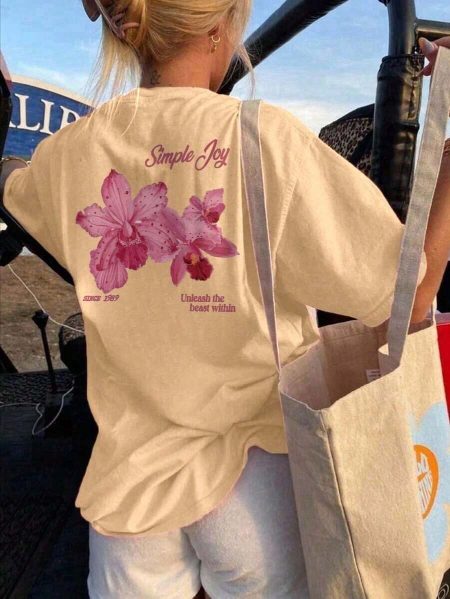 Soft Women's Crew Neck T-Shirt With A Colorful Letter And Floral Print, A Fashionable And Versatile Relaxed Oversized Fit. Graphic Blouses For Women In White And Pink, Vacation Outfits For Women. - 杏色 - 查看 1