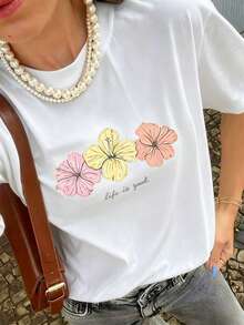 Oferta limitada en tiempo limitado T-shirts Women's Letter Camiseta divertida Promoción de nuevo lanzamiento Print T-shirts Camiseta de manga corta con cuello redondo elástico, estampado de hibisco y eslogan colorido, nuevo estilo de verano para mujer. Estilo retro suave, llamativo y cómodo, adecuado para el campus/ir al trabajo, reuniones de fin de semana, fiestas de verano en el patio, citas informales de verano. RLWZ - Blanco - Ver 2