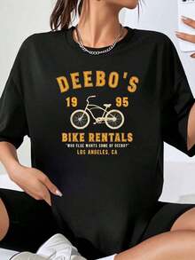 Deebos Bike Rentals 1995 Los Ángeles, California, Camiseta con Gráfico de Bicicleta y Eslogan "¿Quién Más Quiere un Poco de Deebos?", Camiseta Unisex de Talla Grande, Playera Holgada para Mujer - Negro - Ver 7