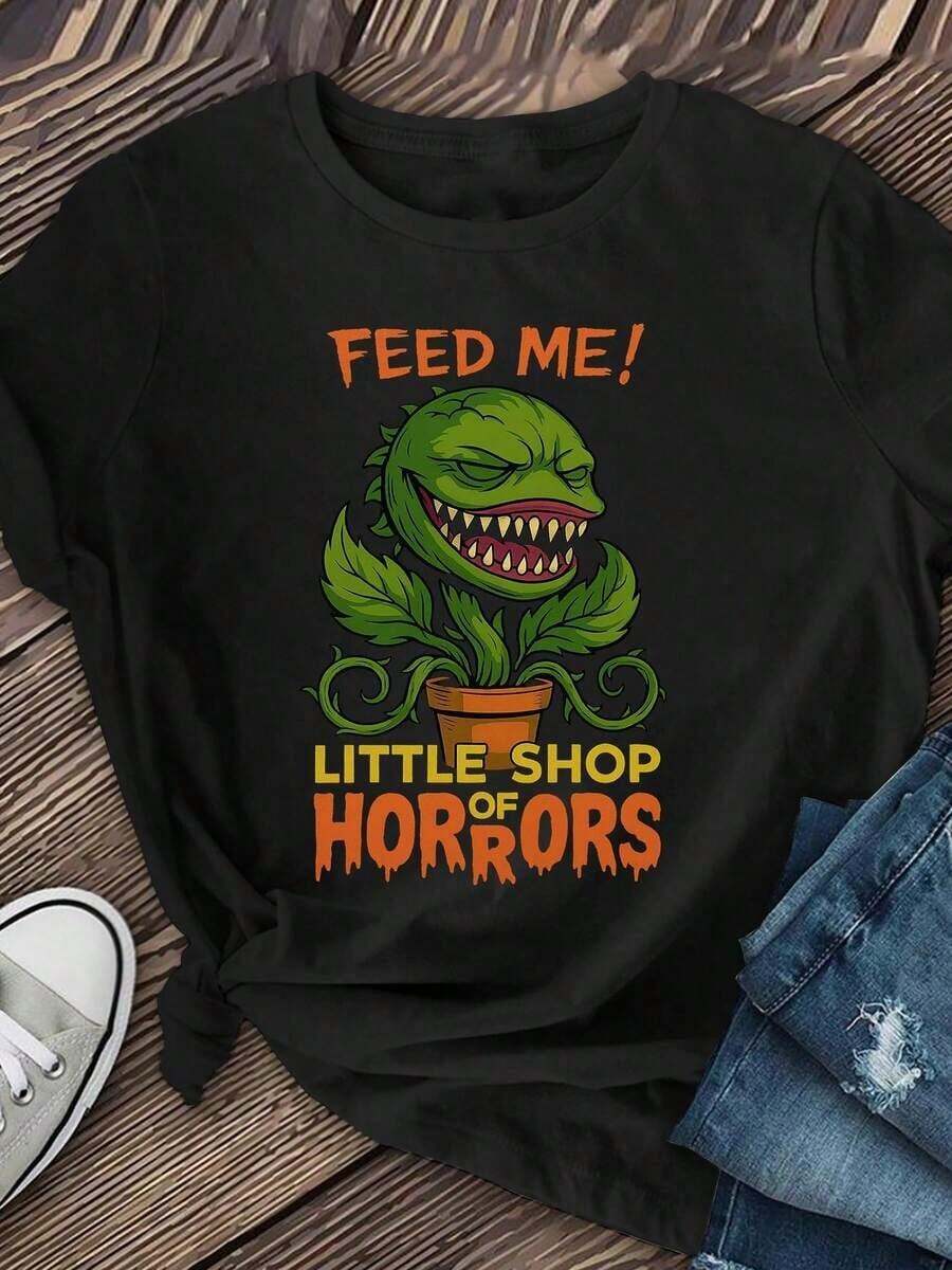 Camiseta única con diseño de planta carnívora inspirado en Y2K perfecta para los amantes del cine de horror y la cultura pop, ¡destaca con estilo en cualquier ocasión! Ideal para quienes buscan un toque divertido y original en su guardarropa. - Negro - Ver 1