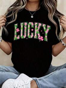 Playeras de mujer: Camiseta de algodón blanca con diseño gráfico de trébol rosa y verde para el Día de San Patricio, ideal para uso festivo. Blusas casuales para dama. - Negro - Ver 1