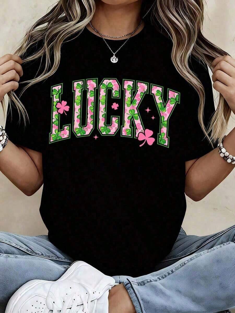 Playeras de mujer: Camiseta de algodón blanca con diseño gráfico de trébol rosa y verde para el Día de San Patricio, ideal para uso festivo. Blusas casuales para dama. - Negro - Ver 1