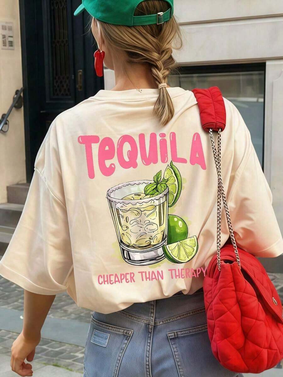 Una camiseta de verano para mujer, de corte holgado, cuello redondo y manga corta, estampada con un diseño que muestra tequila, limón y la frase en inglés "Use alcohol to relieve stress", adecuada para vacaciones, oficina, salidas, uso diario, citas, fiestas, reuniones, ropa urbana, carnavales, festivales de música, Día de San Valentín y otras ocasiones informales. 100% algodón. - Albaricoque - Ver 1