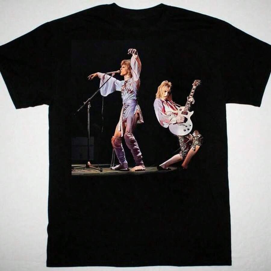 Mick Ronson VTG T-shirt Svart Bomull Alla Storlekar herrkläder herrkläder bomulls-t-shirt herr t-shirts för män sommarkläder herr herrs sommarkläder band-t-shirts herr-t-shirts semesterkläder för kvinnor enkla sommarkläder jerseytoppar dam resortkläder i stil Sommarkläder för kvinnor bomullstoppar sommartoppar sommarkläder toppar för kvinnor vita toppar festtopp - Svart - Visa 1