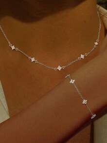 1 Set de collar y pulsera para mujer, estilo de capas delicado con borlas para vacaciones en la playa, pulsera y collar de joyería con trébol de cuatro hojas de cobre incrustado de circonita, accesorio diario como regalo - Plateado - Ver 1