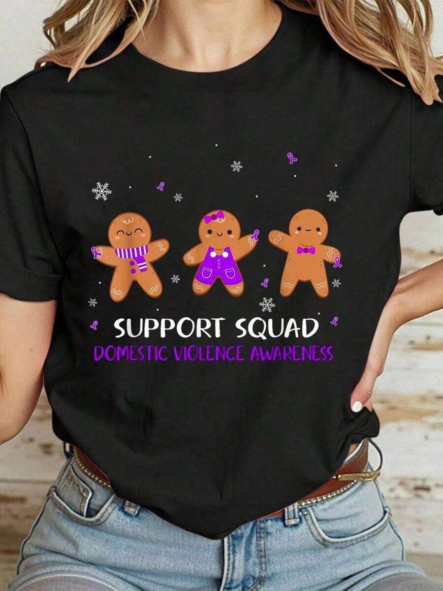 Camiseta Casual 100% Algodón para Mujer, con Diseño de Galleta Navideña y Mensaje de Apoyo a la Concientización sobre Violencia Doméstica - Negro - Ver 1