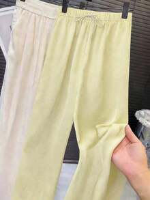 Pantalones rectos de cintura alta con goma elástica de satén, con brillos y anudado a la cintura - Amarillo - Ver 2