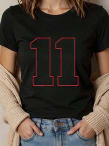 100% algodón, camiseta de mujer cómoda y holgada de talla grande con cuello redondo y estampado de la cifra 11 en rojo. - Negro - Ver 1