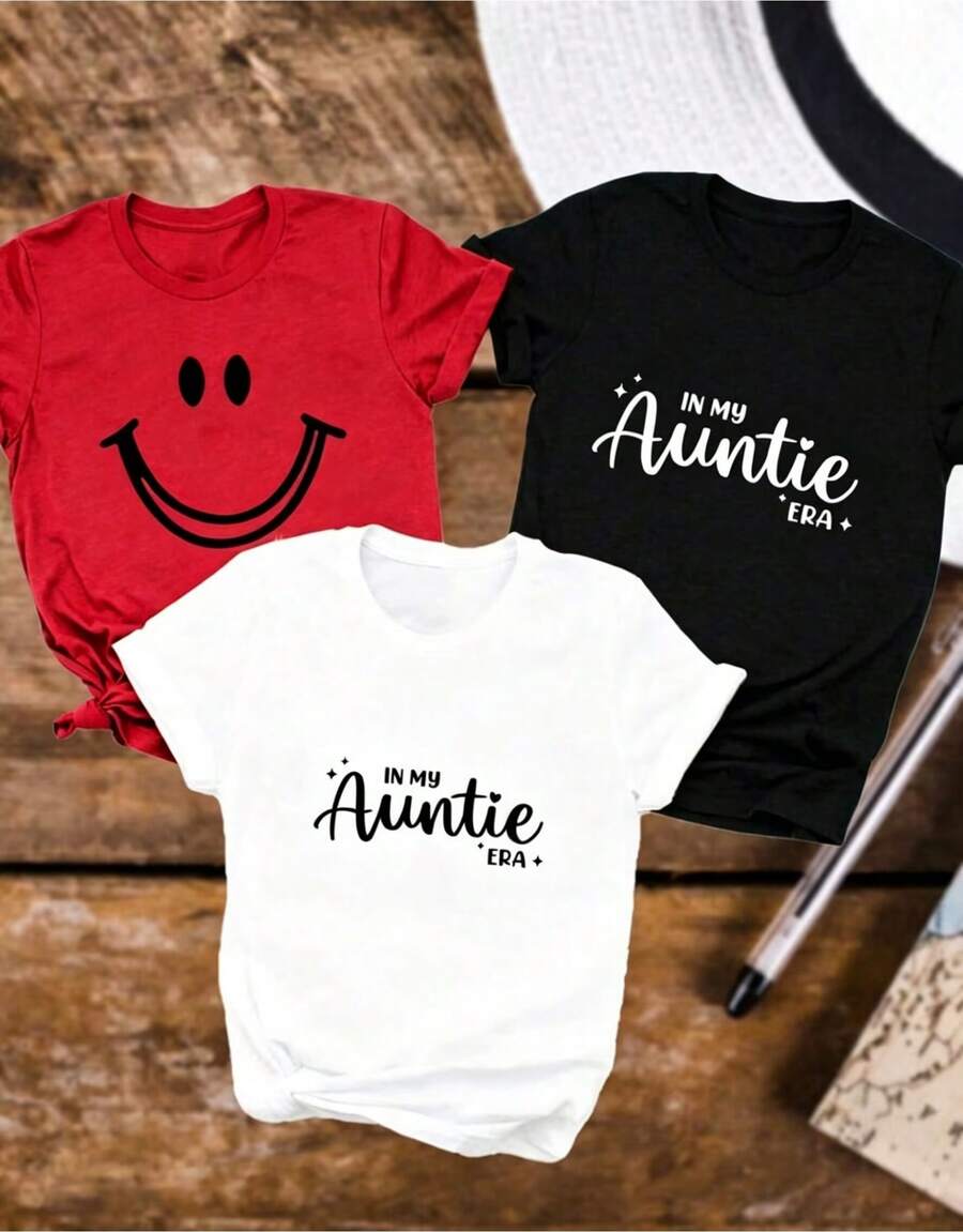 Camiseta de mujer a 2026, 3 pieza de camiseta casual de manga corta para mujer, camiseta con estampado de cara sonriente de la época de mi tía, camiseta de mujer de manga corta con cuello redondo, top deportivo casual transpirable de algodón puro, regalo de vacaciones para primavera, mariposa, Pascua. - Negro - Ver 1