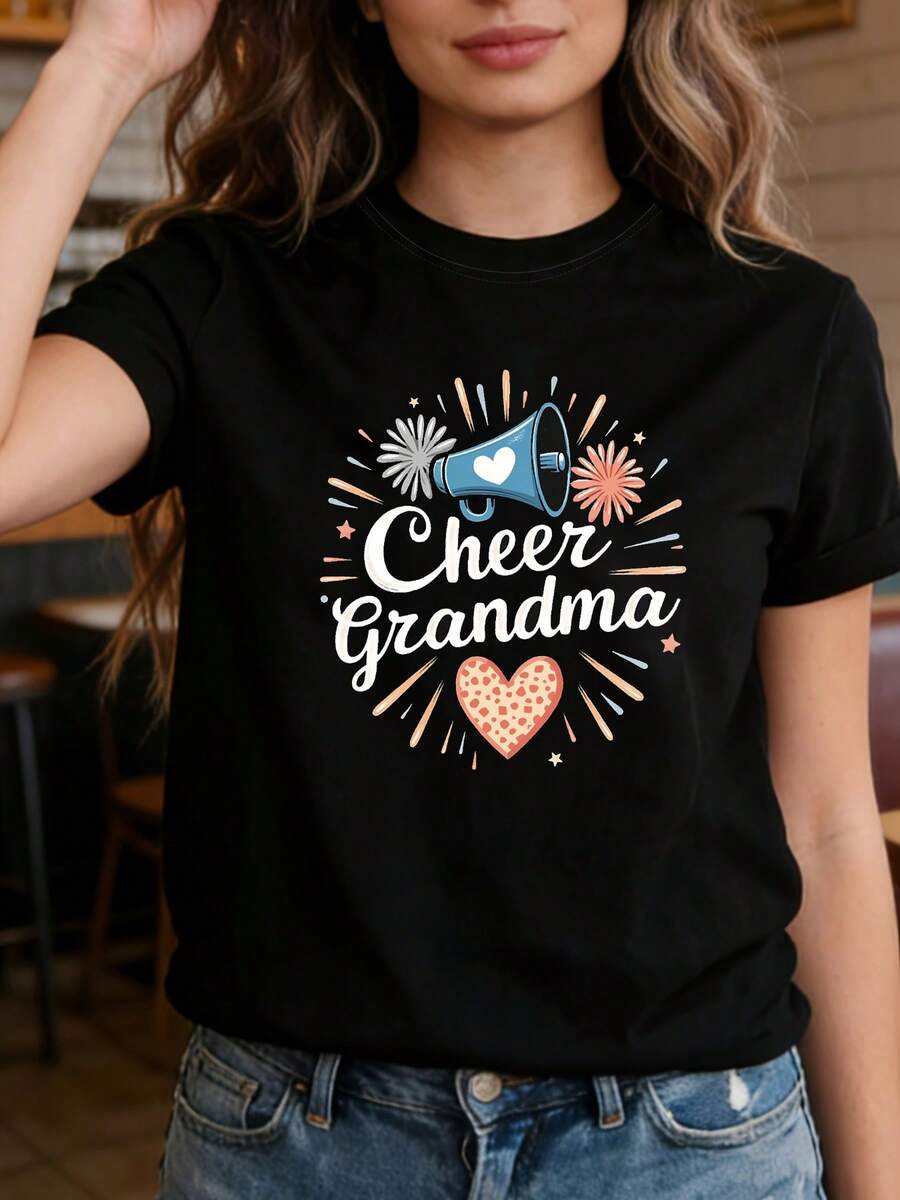 Camiseta de mujer con estampado de trompetas, fuegos artificiales y el texto "Cheer Grandma", cuello redondo, manga corta, para primavera y verano. Adecuada para salidas informales, regalos navideños, reuniones de amigos, fiestas de música y ropa de vacaciones. - Negro - Ver 1