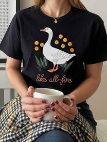 Camiseta Casual de Verano para Mujer, con Bordado de Patrón de Ganso "Like Fire" - Diseño Adorable Inspirado en Libros con Detalles Florales, Manga Corta y Cuello Redondo, Adecuada para Primavera y Verano, Lavable a Máquina, Camiseta para Mujer. - Negro - Ver 12