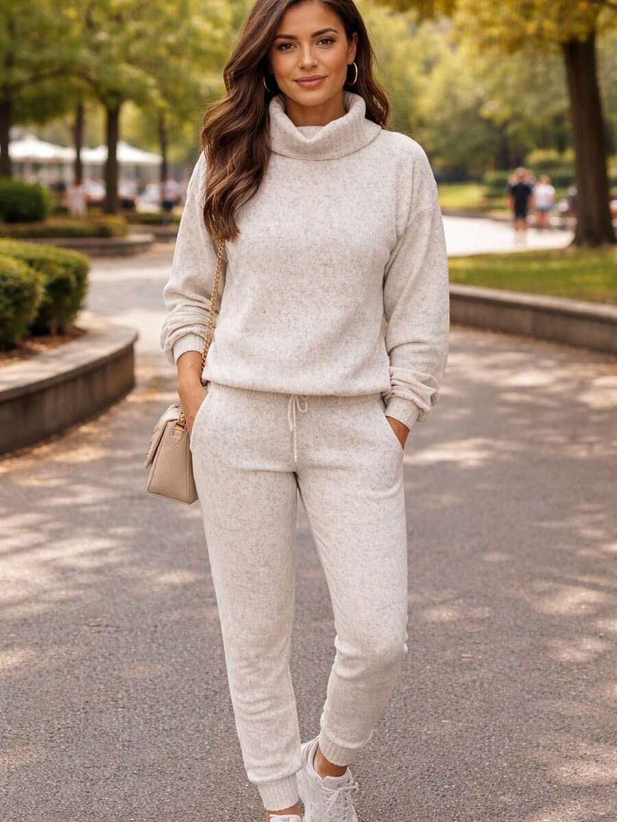 Set Of Pants And Turtleneck Sweater In Mousse Knit Fabric. - Off With Handle - View 1