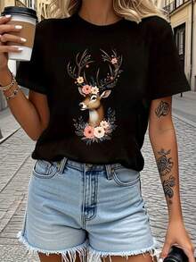 Camiseta de mujer, talla grande, estilo fresco y natural, con estampado de diseño creativo "La Belleza del Ciervo en el Bosque", camiseta de cuello redondo para primavera-verano, con un toque de historia campestre, suave y transpirable, ideal para fiestas temáticas y uso diario, adecuada para todas las estaciones. - Negro - Ver 1