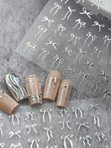 1张5D立体银色蝴蝶结美甲贴纸，金属丝带蝴蝶结美甲贴花，浮雕自粘美甲贴纸，DIY美甲装饰，适合女性和女孩 - 銀色 - 查看 6