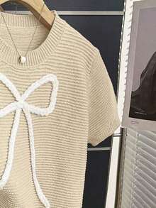 2026Franclia Nuevo suéter de punto casual con lazo dulce y lindo en color rosa para mujer, blusa de lazo rosa bebé de manga corta para primavera/verano, blusas de punto con lazo lindas para mujer - Albaricoque - Ver 7
