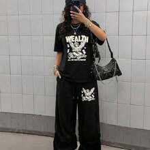 Camiseta para Mujer con Estampado de Diente y Pasta Dental, Manga Corta - Negro - Ver 1