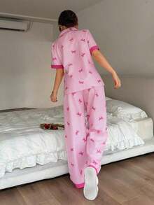 Napfluff Conjunto de pijama con top de manga corta con botón rojo y pantalones con estampado a rayas y lazo de color contrastante; Conjunto de pijama a rayas rosas con lazo estampado, adecuado para uso en casa - Rojo - Ver 8