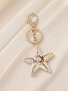 1 chiếc móc khóa hình sao biển phong cách Bohemian, móc khóa sao biển đính ngọc trai giả, thủ công, có thể có sự khác biệt nhỏ về hình dạng, phụ kiện sang trọng đa năng. - trắng - Xem 6