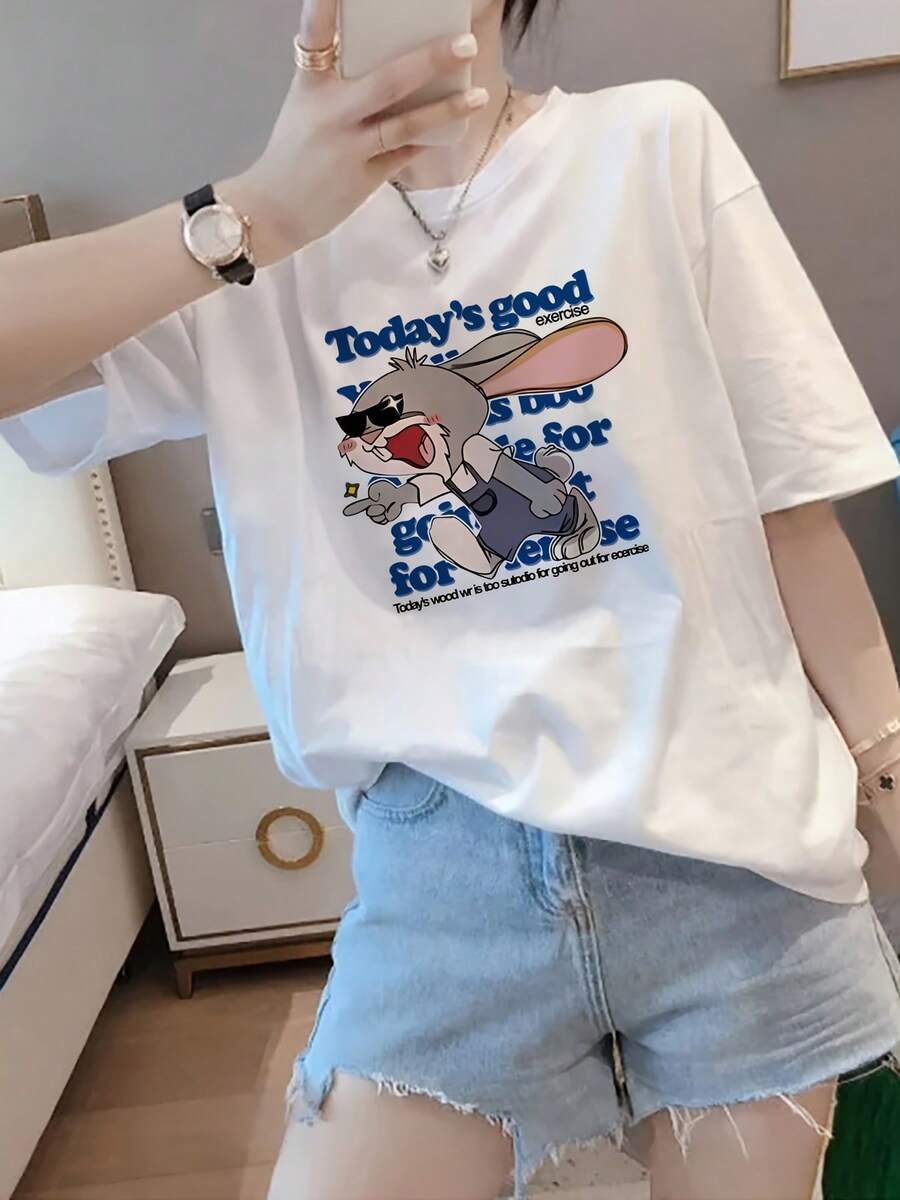 Camiseta de manga corta para mujer presenta un estampado de conejos de dibujos animados y es perfecta para un look casual de primavera, verano y otoño al estilo Y2K.Tiene cuello redondo. OIPO - Blanco - Ver 1