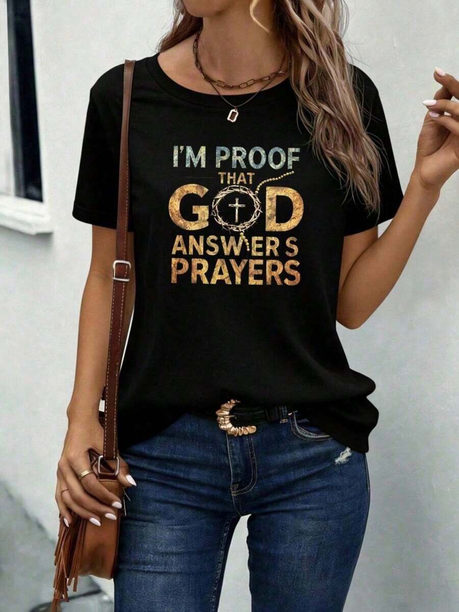 I Am Proof That God Answers Prayers - Short Sleeve T-Shirt With Cross Print - Women's Christian Faith Inspirational Graphic Tee, Casual Sweater With Religious Cross Design, Soft, Breathable, Medium Stretch Fabric, Machine Washable, Perfect For Daily Wear, Church, Bible Study, Or Relaxing In Spring, Summer, And Autumn. - 黑色 - 查看 1