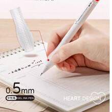 2 chiếc bút bi rút màu đen, hình trái tim sáng tạo. - A - Xem 2