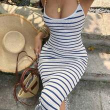 guang zhou mi qian shang mao  Vestido sexy y elegante de ajuste ceñido con accesorio de cintura con cuentas, cuello halter y textura en blanco y negro, ideal para vacaciones y citas - Azul y blanco - Ver 1