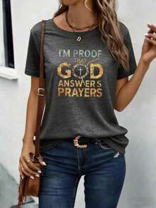 Soy prueba de que Dios responde a las oraciones - Camiseta de manga corta con estampado de cruz – Camiseta gráfica inspiradora de fe cristiana para mujeres, suéter casual con diseño de cruz religiosa, tela suave, transpirable y de elasticidad media, lavable a máquina, perfecta para uso diario, iglesia, estudio bíblico o para relajarse en primavera, verano y otoño. - Gris - Ver 1