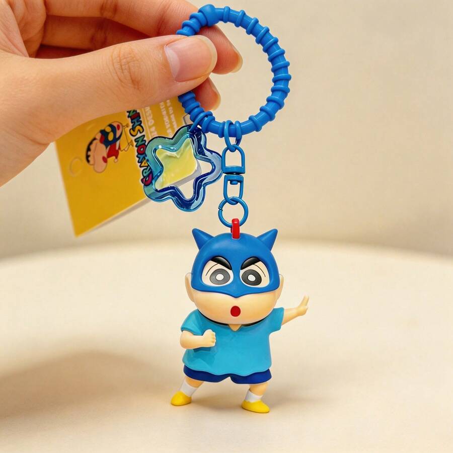 MINISO Crayon Shin-Chan Cartoon Keychain With Playful Expressions, Ideal For Backpack, Handbag, Or Key Decoration, Fun Collectible Accessory, Vibrant And Durable Design, Multiple Styles Available - Baby Blue - View 1
