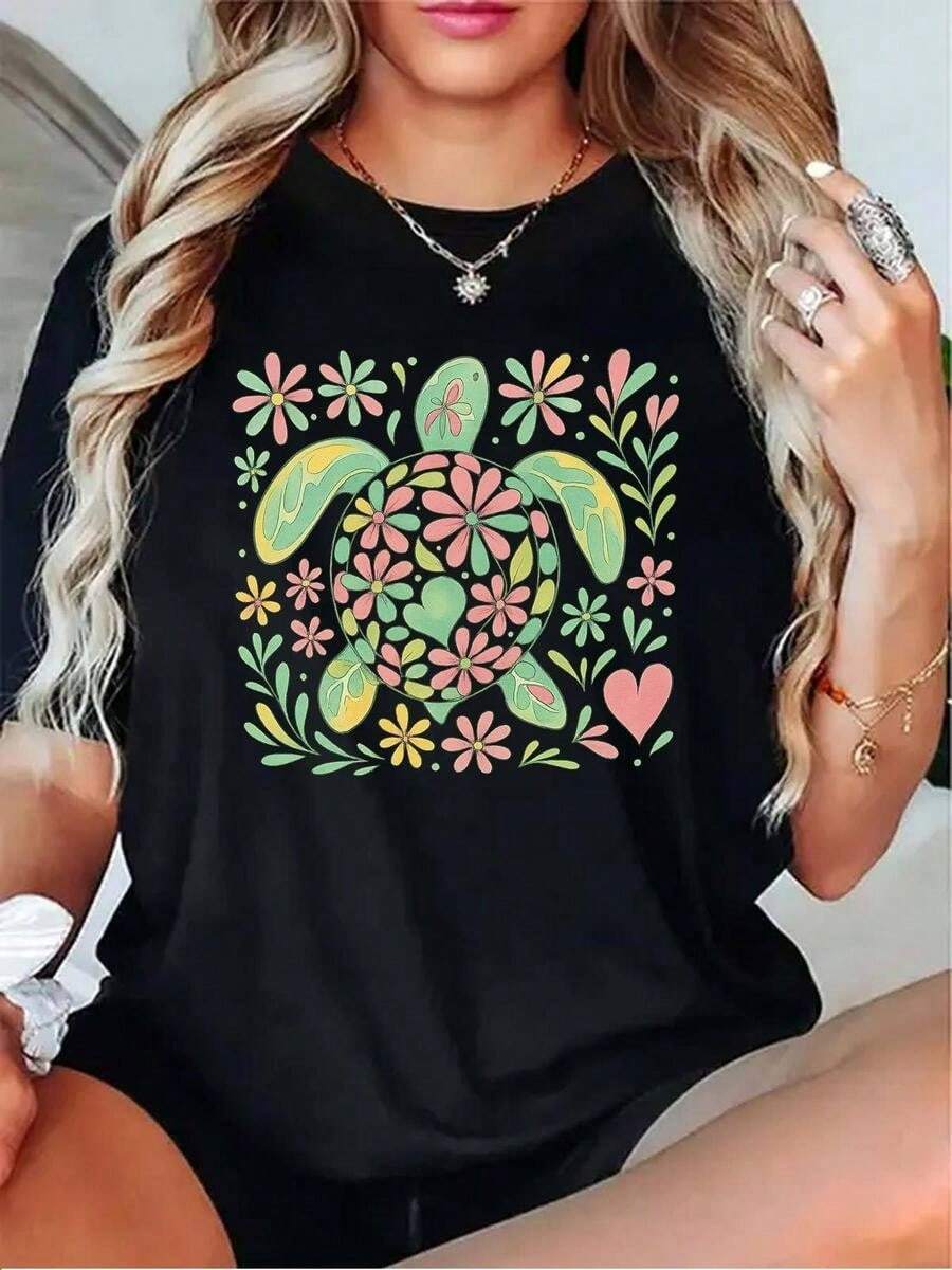 1 pieza de playera para hombre y mujer, 100% algodón puro, cuello redondo casual con estampado, manga corta transpirable para uso diario, dise?o de corazones con motivos de tortuga marina y flores - Negro - Ver 1