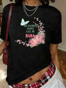 Camiseta con estampado floral de mariposa Nana en acuarela, camiseta de manga corta con cuello redondo, top casual para verano y primavera, ropa de talla grande para mujer. - Negro - Ver 7