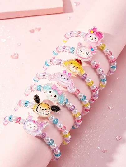 SANRIO 7件套三丽鸥女孩可爱小猫、小狗和珍珠串珠手链套装，适合节日派对、学校、生日礼物等场合。