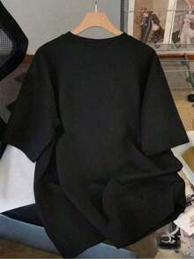 Camiseta de manga corta con cuello redondo y estampado para mujer, hecha de tela de algodón puro. Con un diseño clásico y minimalista de cuello redondo, es fácil de combinar y adecuado para todo tipo de cuerpos. Una opción ideal para citas, desplazamientos diarios y salidas informales. - Negro - Ver 4