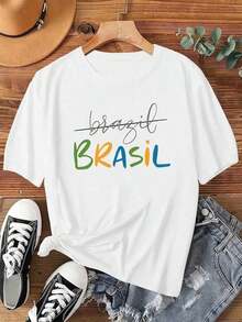 NEWA Fashion's Colorful Cotton T-Shirt Features A Design Combining The Handwritten Word "Brazil" With Colorful Capital Letters. This Brand-New, Short-Sleeved Summer T-Shirt For Women Is A , Casual Printed T-Shirt. It's Stylish Women's Clothing. This Women's Soccer T-Shirt Is Perfect For Fans To Wear While Cheering On Their Team. It Has A Retro Urban Style, Is Unisex, Has A Loose Fit, Short Sleeves, And A Crew Neck. - 白色 - 查看 7