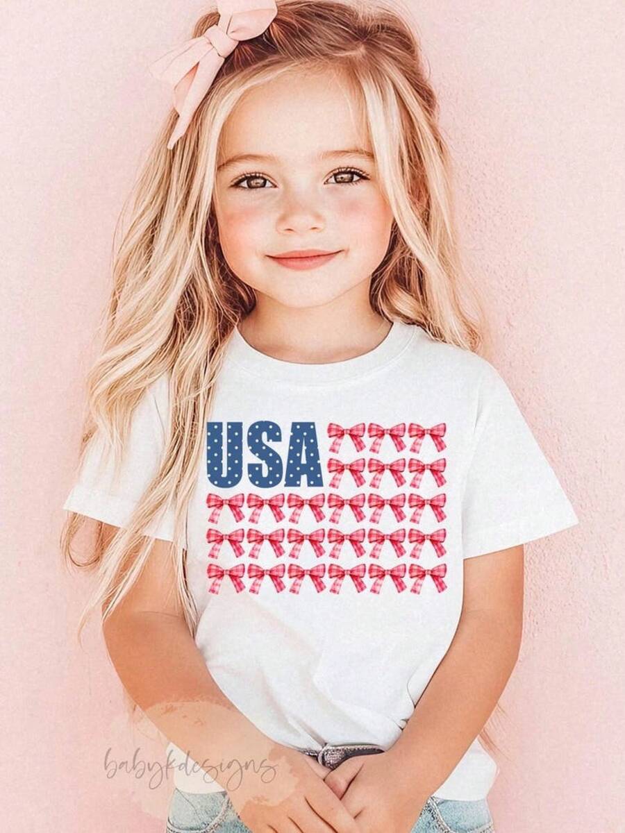 Camiseta de EE. UU., Camiseta Coqueta con Bandera para Niñas, Camiseta Patriótica para Niños Pequeños del 4 de Julio, Camiseta Preppy con Lazo Coqueta, Camiseta Floral de EE. UU., Camiseta Coqueta del 4 de Julio, Camiseta de Manga Corta de Verano para Mujer, a la Moda, Blusas Casuales de Cuello Redondo Lisas y Estampadas, Blusas Cómodas de Algodón Suave de Primera Calidad, Ropa Holgada y Amigable para la Calle. - Blanco - Ver 1