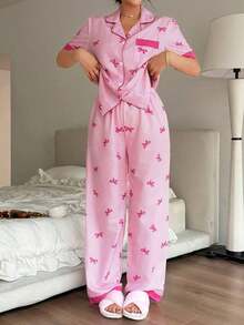 Napfluff Conjunto de pijama con top de manga corta con botón rojo y pantalones con estampado a rayas y lazo de color contrastante; Conjunto de pijama a rayas rosas con lazo estampado, adecuado para uso en casa - Rosa - Ver 6