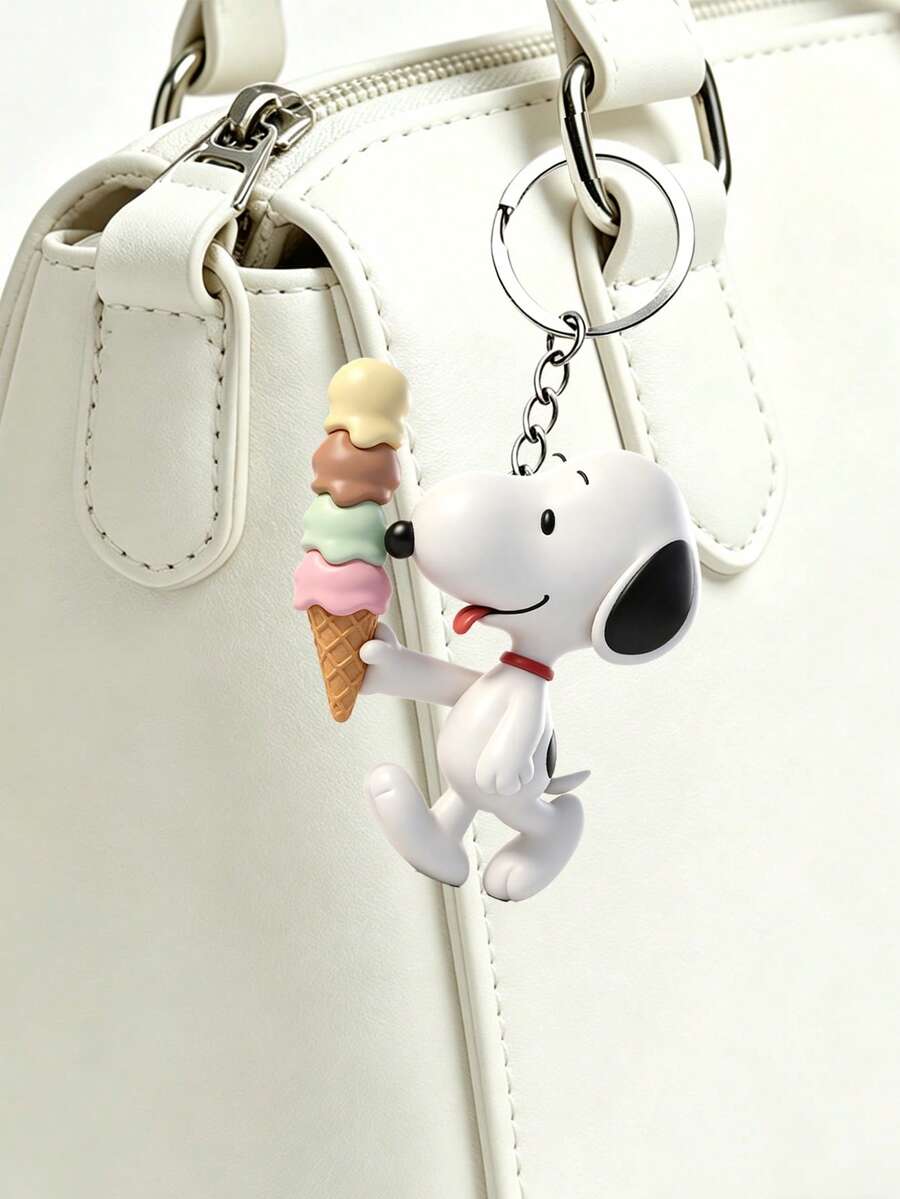 Móc khóa 3D kem Peanuts, hình nhân vật tinh nghịch đang liếm cây kem ốc quế nhiều vị cao. Được chế tác từ nhựa resin mịn, bền với vòng khoen và dây xích kim loại đánh bóng, phụ kiện nhẹ nhàng này mang lại vẻ ngọt ngào, hoài niệm cho chìa khóa, ba lô hoặc túi tote, hoàn hảo để sử dụng hàng ngày hoặc làm quà tặng dễ thương. - Nhiều kiểu dáng - Xem 1