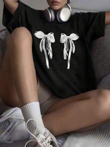 The Most Popular Women's T-Shirt Of 2026! A , Youthful, Lightweight, And Casual Short-Sleeved T-Shirt With An Adjustable Fit. Fosfor T-Shirt. The Material Is Durable And Reliable! - 女士蝴蝶結白色 - 查看 10