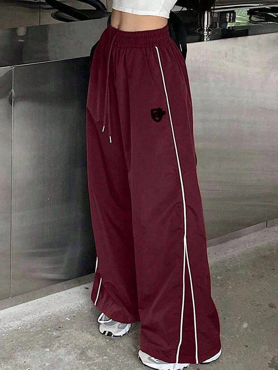 Pantalones casuales de mujer con estampado, cintura con cordón y bolsillos - Rojo - Ver 1