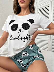 Una camiseta de manga corta para mujer con estilo retro americano, de corte holgado y con diseño estampado (los pantalones son solo para sugerencias de estilo). Esta pieza sencilla y elegante presenta un patrón de letras impresas con temática tropical, lo que la convierte en un elemento imprescindible para crear un look relajado de vacaciones, perfecto para ocasiones como el Día del Trabajo y el Día de la Independencia de México. - Blanco - Ver 1